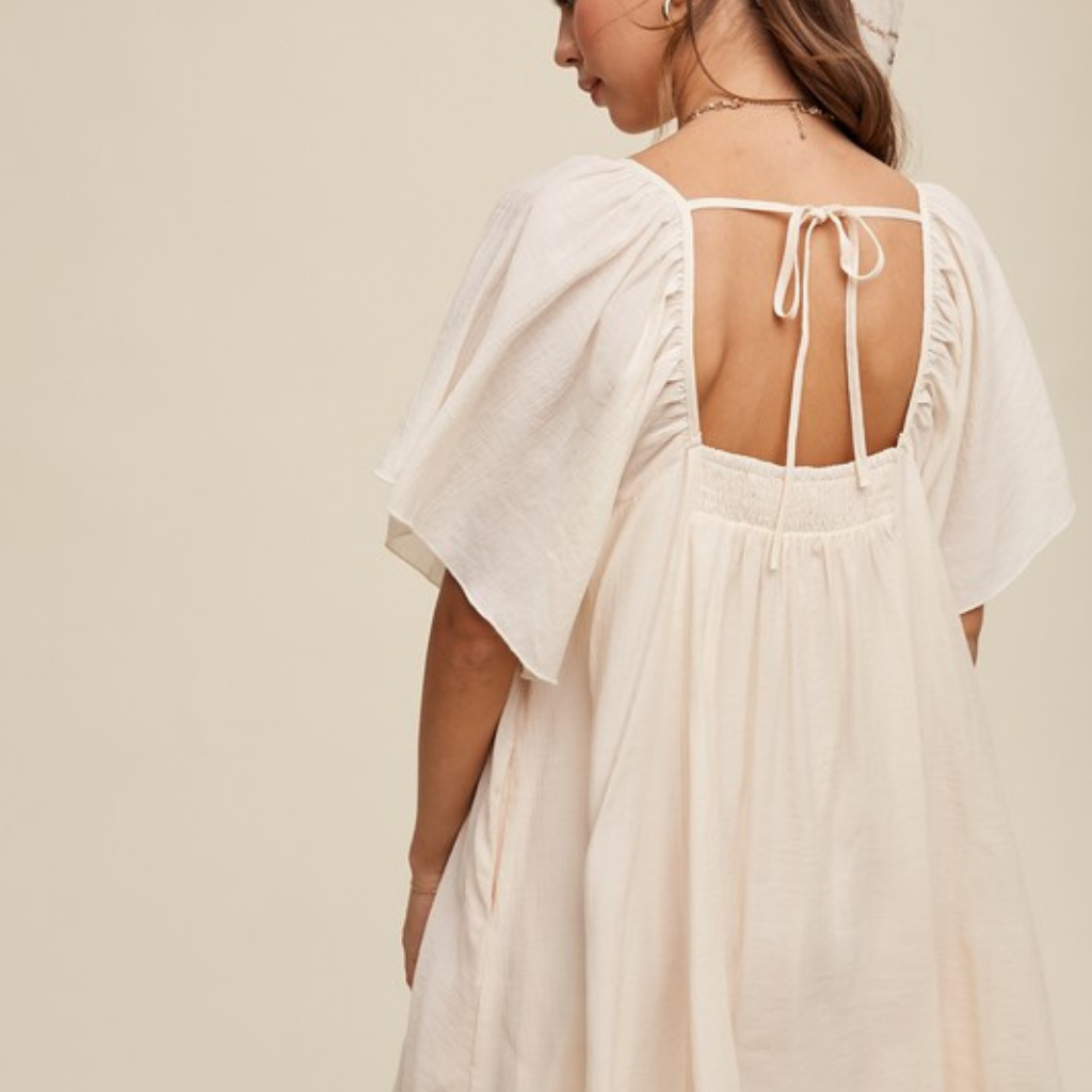 the uma swing dress in cream – blackbird + lou