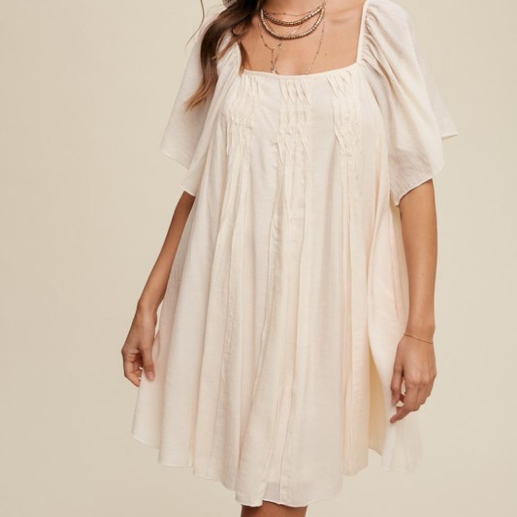 the uma swing dress in cream